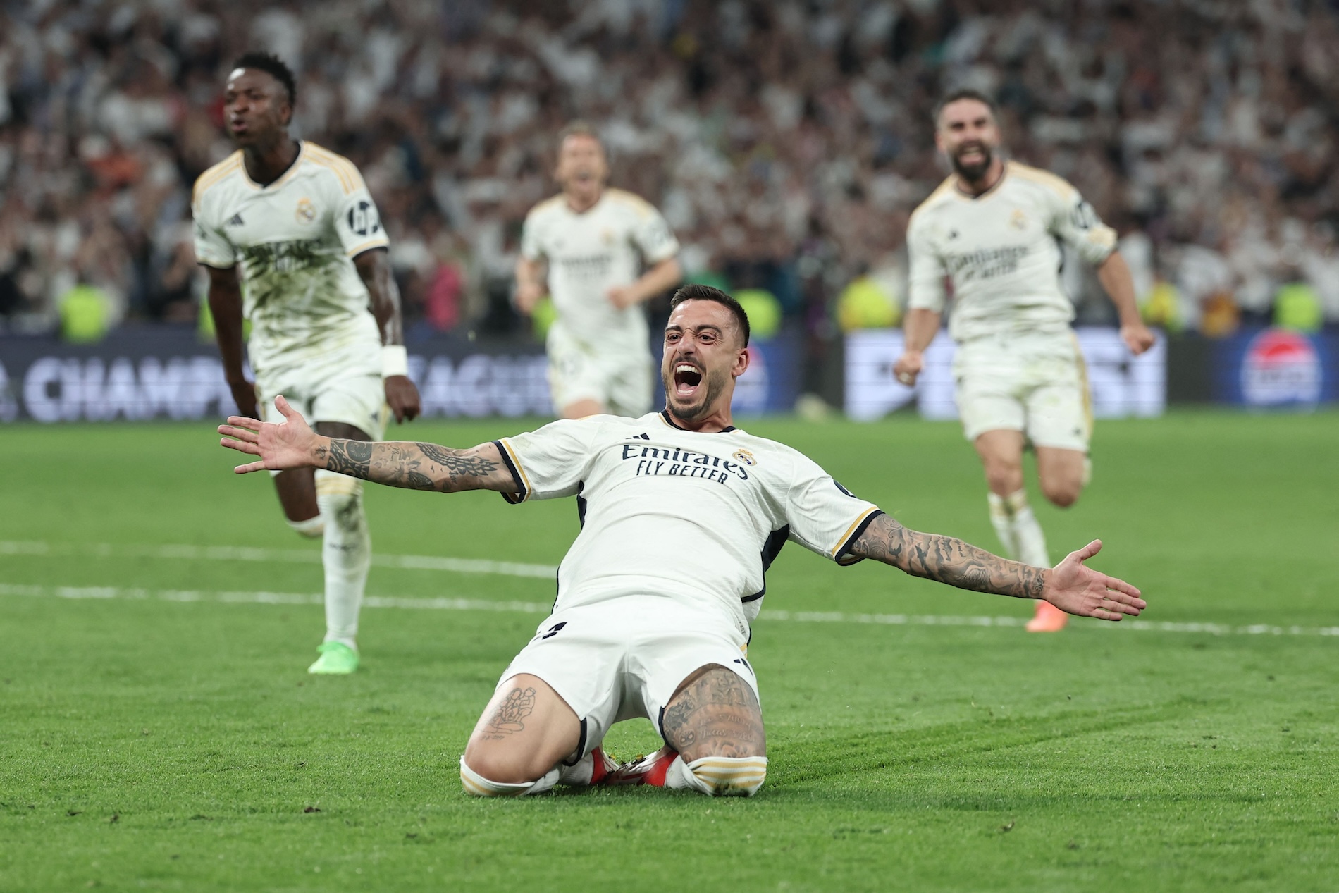 Real Madrid's Spanish forward Joselu celebrates scoring during the UEFA Champions League semifinal second leg football match between Real Madrid CF and FC Bayern Munich at the Santiago Bernabeu stadium in Madrid on May 8, 2024. (AFP)