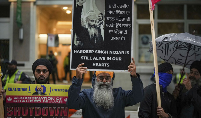 People protest outside the Indian Consulate, in Vancouver, British Columbia, on September 25, 2023. (The Canadian Press via AP)