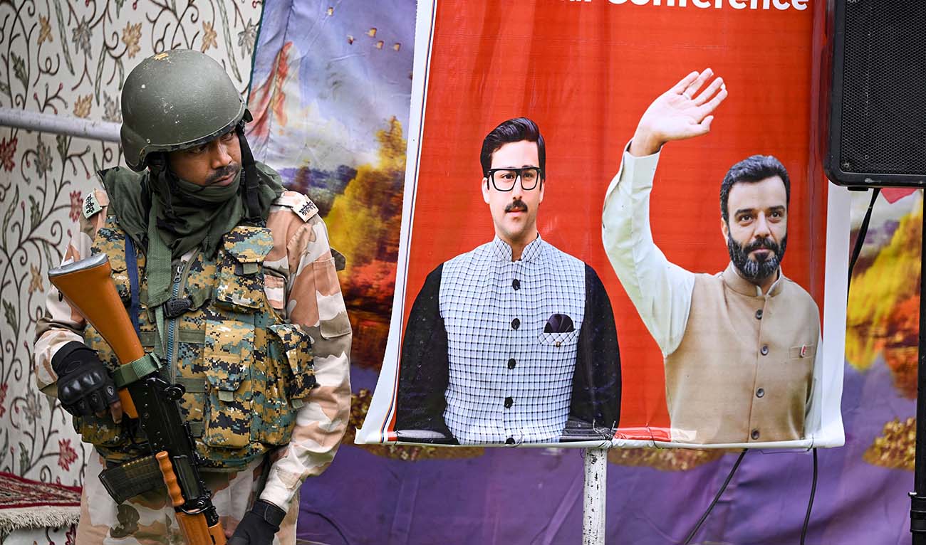 In this photo taken on May 3, 2024, an Indian security personnel stands guard during Jammu and Kashmir National Conference (NC) leader and former Jammu and Kashmir Chief Minister Omar Abdullah's public meeting in Srinagar. (AFP)