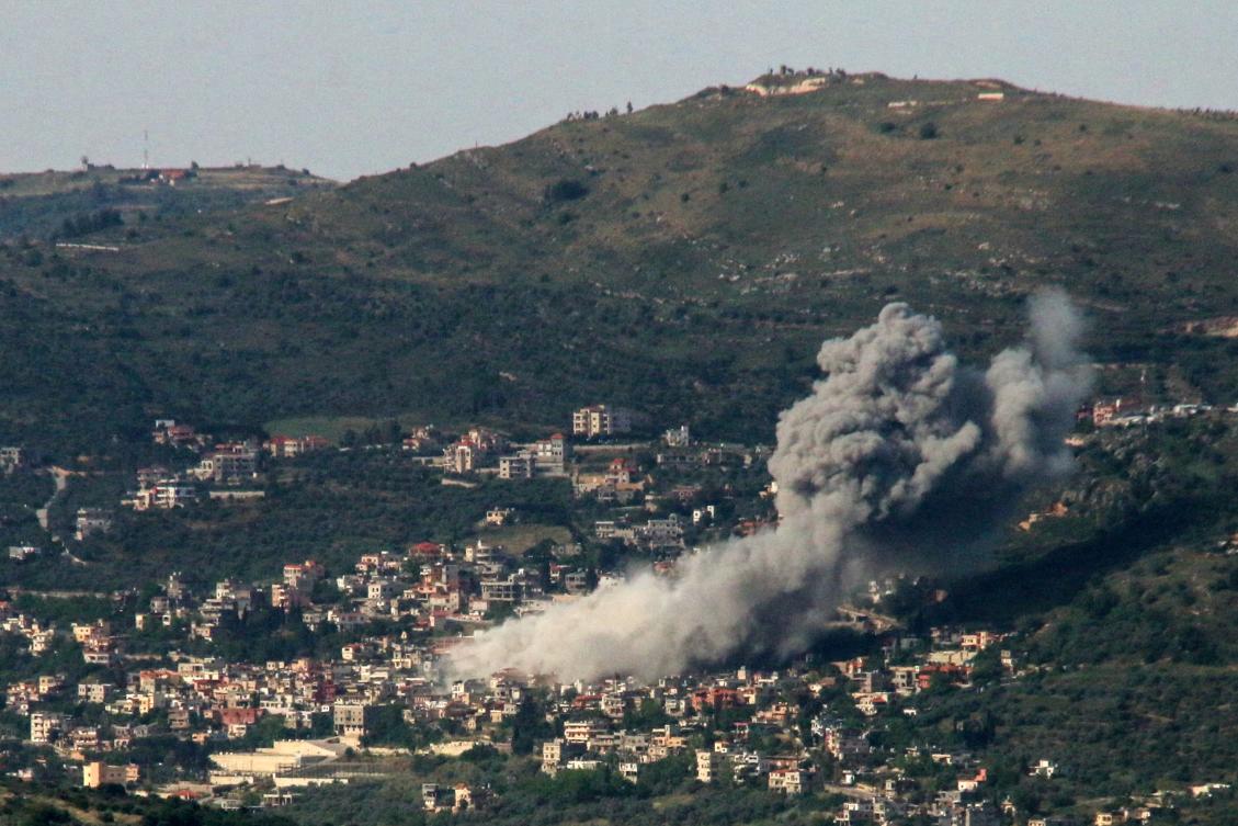 Smoke billows over the southern Lebanese village of Kfar Kila following Israeli bombardment on May 10, 2024, amid ongoing cross-border clashes between Israeli troops and Hezbollah fighters. (AFP)