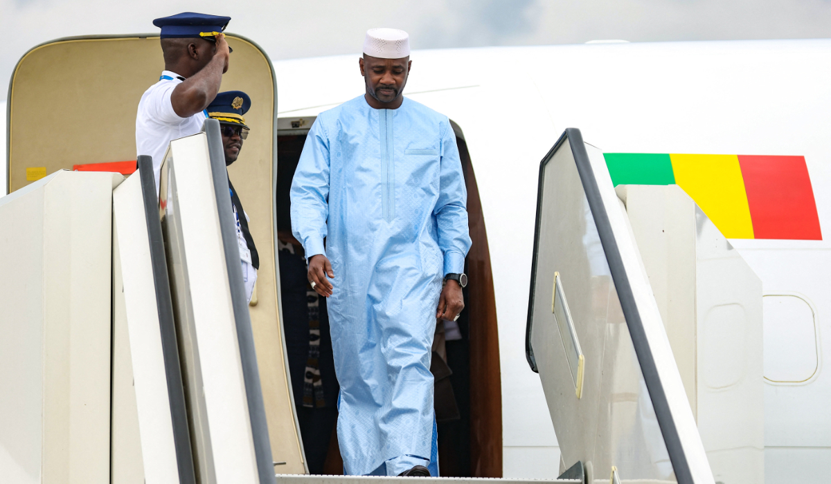 The leader of Mali's junta, Assimi Goita, is welcomed upon arrival at Pulkovo airport ahead of the second Russia-Africa summit, in Saint Petersburg on July 26, 2023. (AFP)