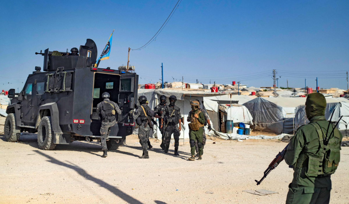 A picture shows the Kurdish-run Al-Hol camp, which holds relatives of suspected Daesh group fighters in the northeastern Hasakeh governorate, during a security operation by the Kurdish Asayish security forces and the special forces of the Syrian Democratic Forces, on August 26, 2022. (AFP)