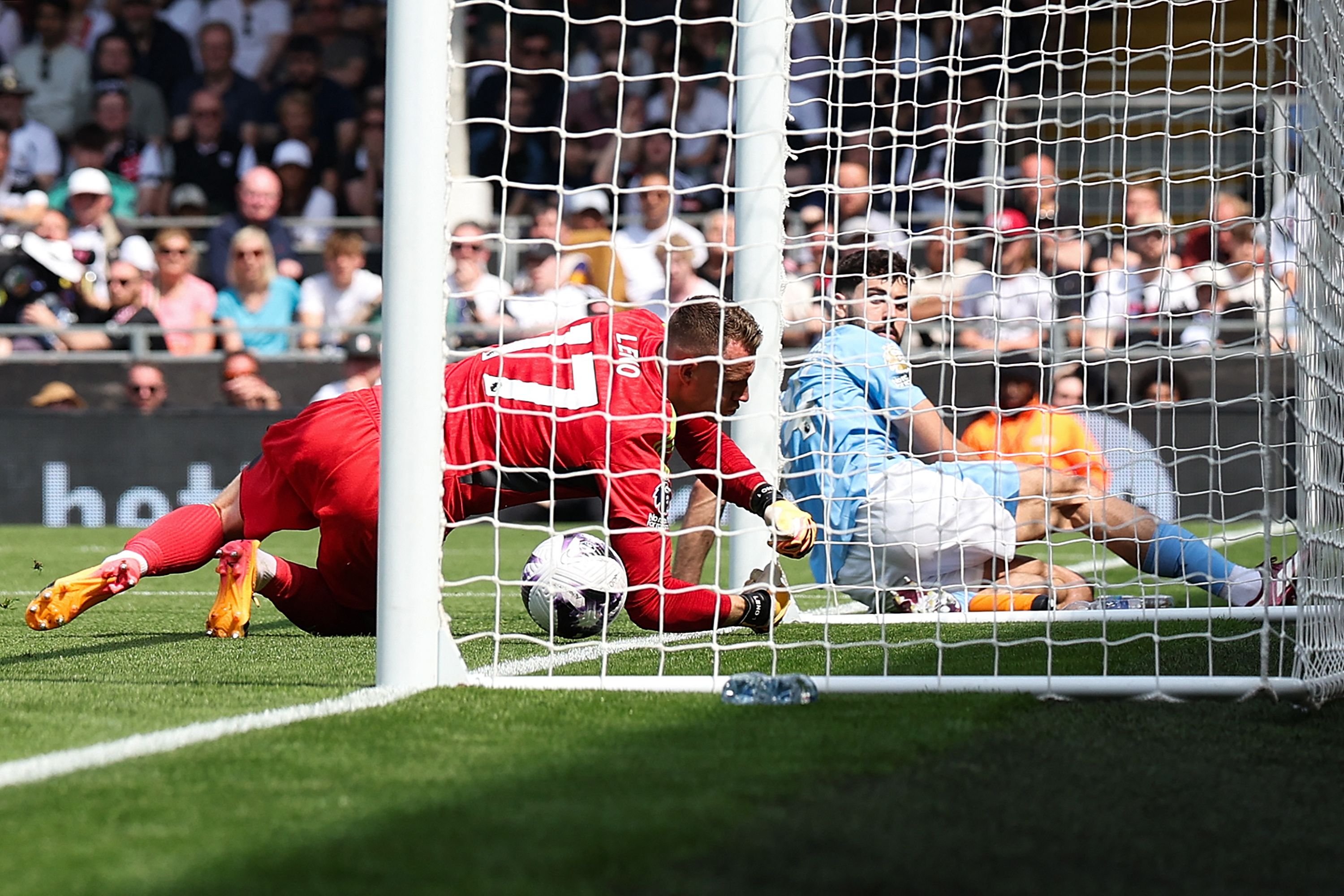Manchester City's Croatian defender Josko Gvardiol scores the team's third goal during the English Premier League football match between Fulham and Manchester City at Craven Cottage in London on May 11, 2024. (AFP)