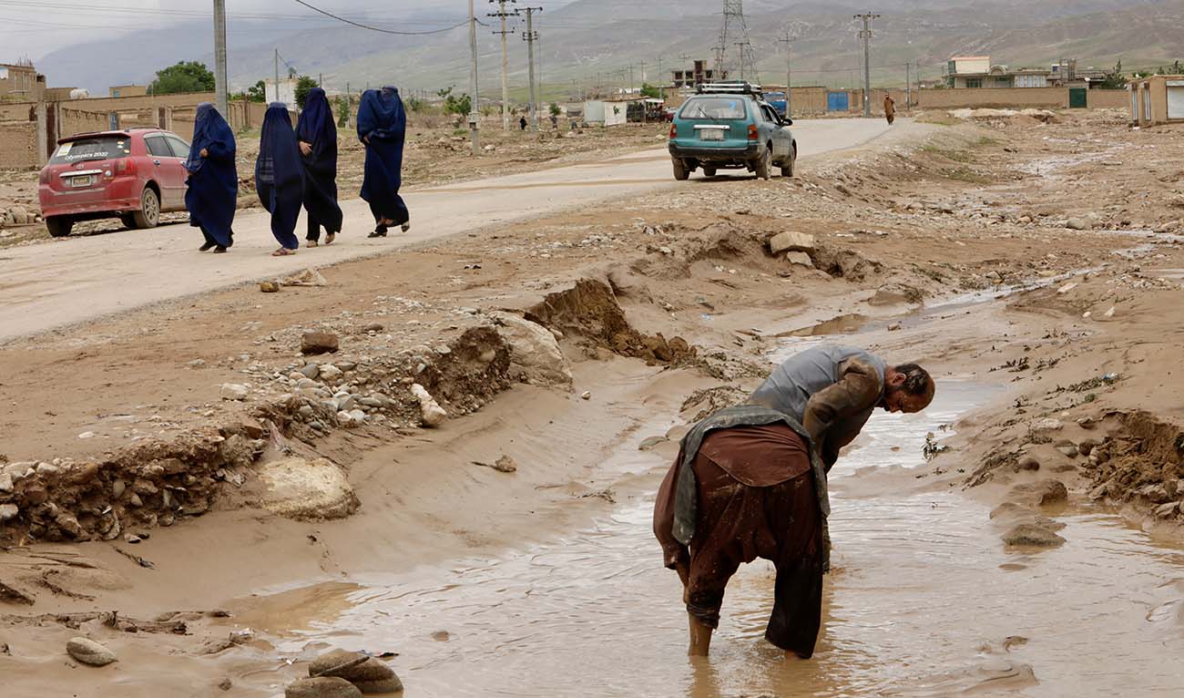 People clean up the area in the aftermath of floods following heavy rain, in Sheikh Jalal District, Baghlan province, Afghanistan May 11, 2024. (REUTERS)