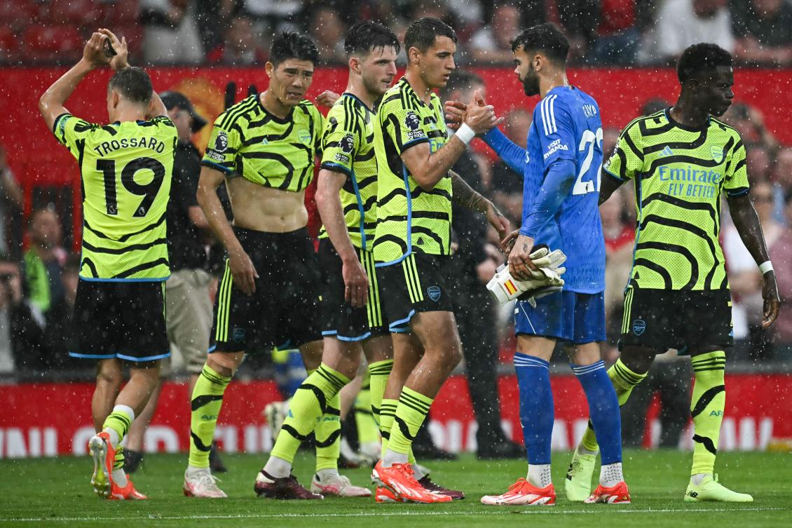 Arsenal react after the English Premier League match between Manchester United and Arsenal at Old Trafford. (AFP)