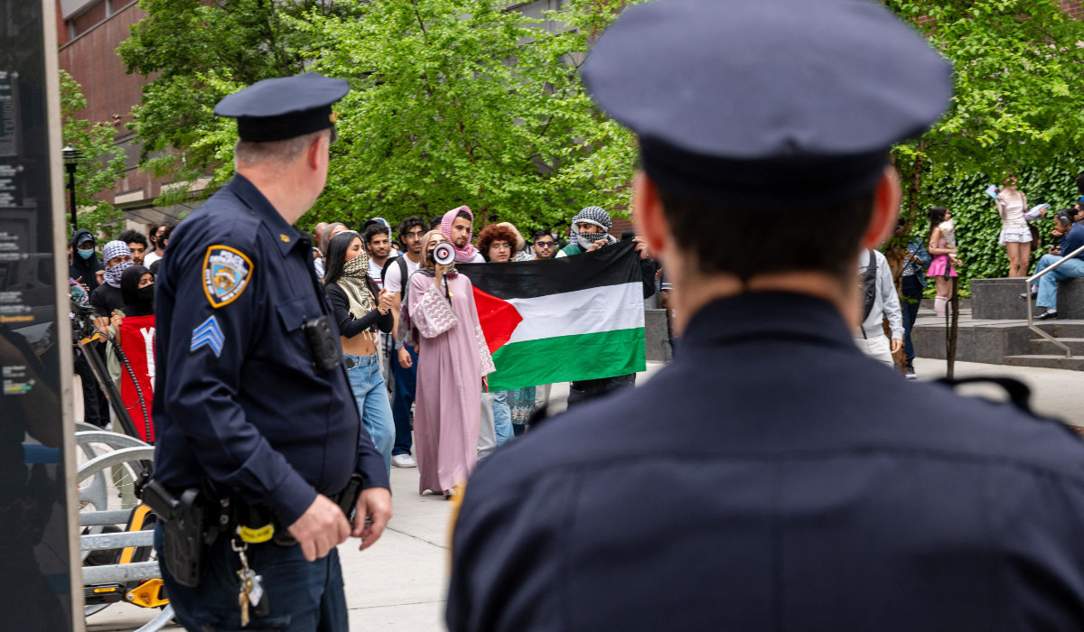 Pro-Palestinian students and others gather outside of Baruch College in Manhattan to protest the school's stance on Israel on May 09, 2024 in New York City. (AFP)