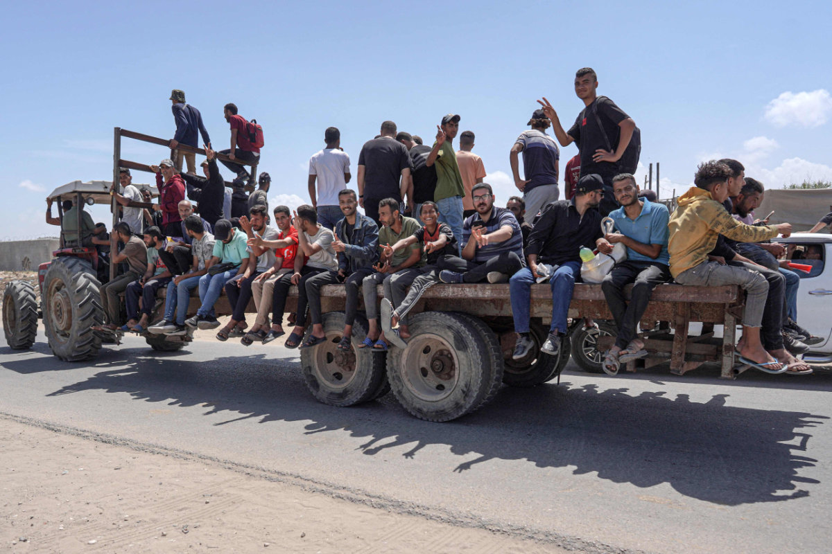 Palestinians who fled Rafah in the southern Gaza Strip arrive to take shelter in Deir el-Balah in the central part of the Palestinian territory on May 12, 2024. (AFP)