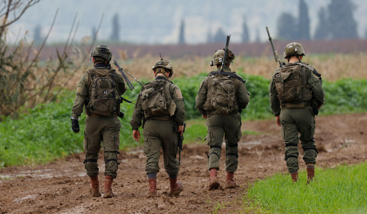 Israeli soldiers patrol an area near the northern kibbutz of Kfar Blum close to the border with Lebanon after Hezbollah said its fighters carried out an aerial attack with two drones against an Israeli air defense system site in the border region on January 25, 2024. (AFP)