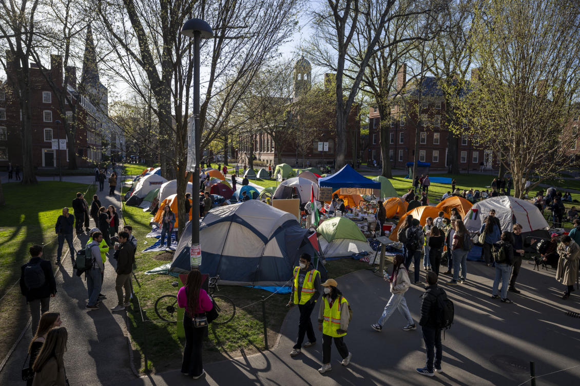 Students protesting against the war in Gaza, and passersby walking through Harvard Yard, are seen at an encampment at Harvard University in Cambridge, Mass., on Apr. 25, 2024. (AP/File)