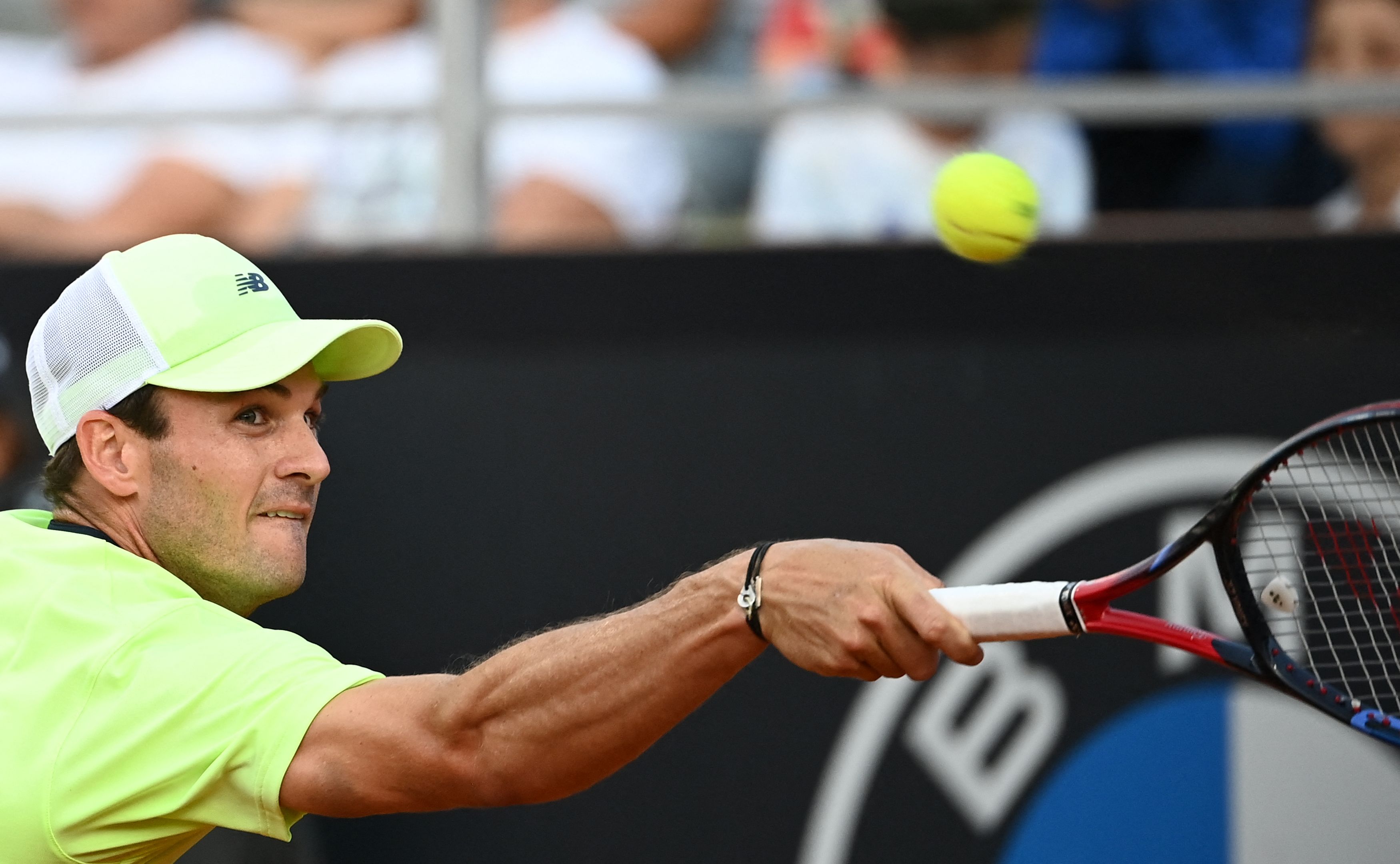 US Tommy Paul plays a forehand return to Russia's Daniil Medvedev during the me's ATP Rome Open tennis tournament at Foro Italico in Rome. ( AFP)