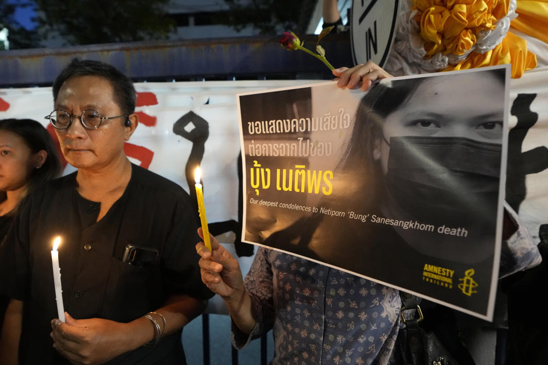 Netiporn Sanesangkhom had two charges of lese majeste pending against her, both of them involving conducting polls in public spaces in 2022 asking people’s opinion about the royal family. (AP)