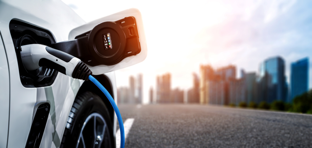 Policy makers should consider shifting the focus from 100 percent electric vehicles to hybrid models, according to the report. Shutterstock
