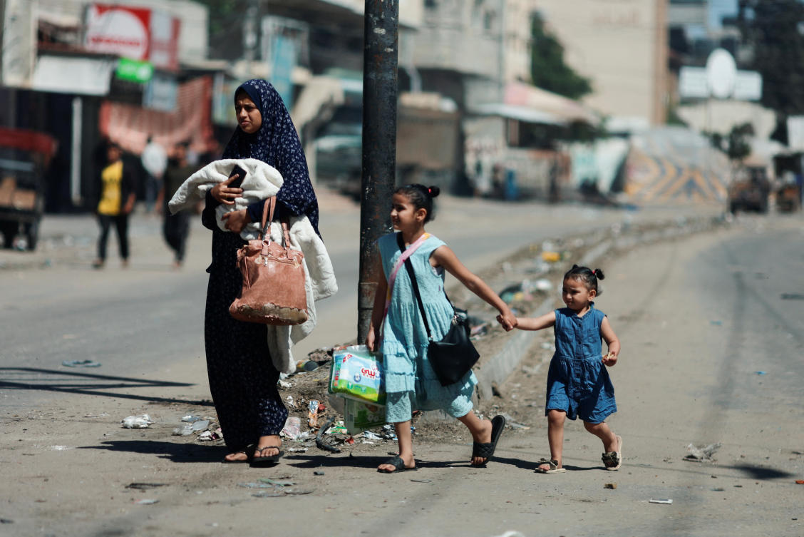Palestinians flee Rafah after Israeli forces launched a ground and air operation in the eastern part of the southern Gaza City in Rafah on May 15, 2024. (Reuters)