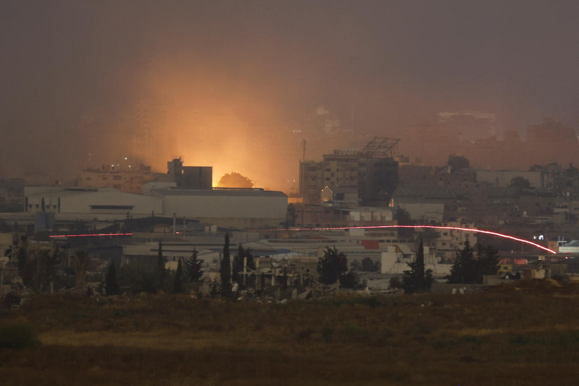 Flames and smoke rise from an explosion in northern Gaza as seen from Israel on May 11, 2024. (Reuters)