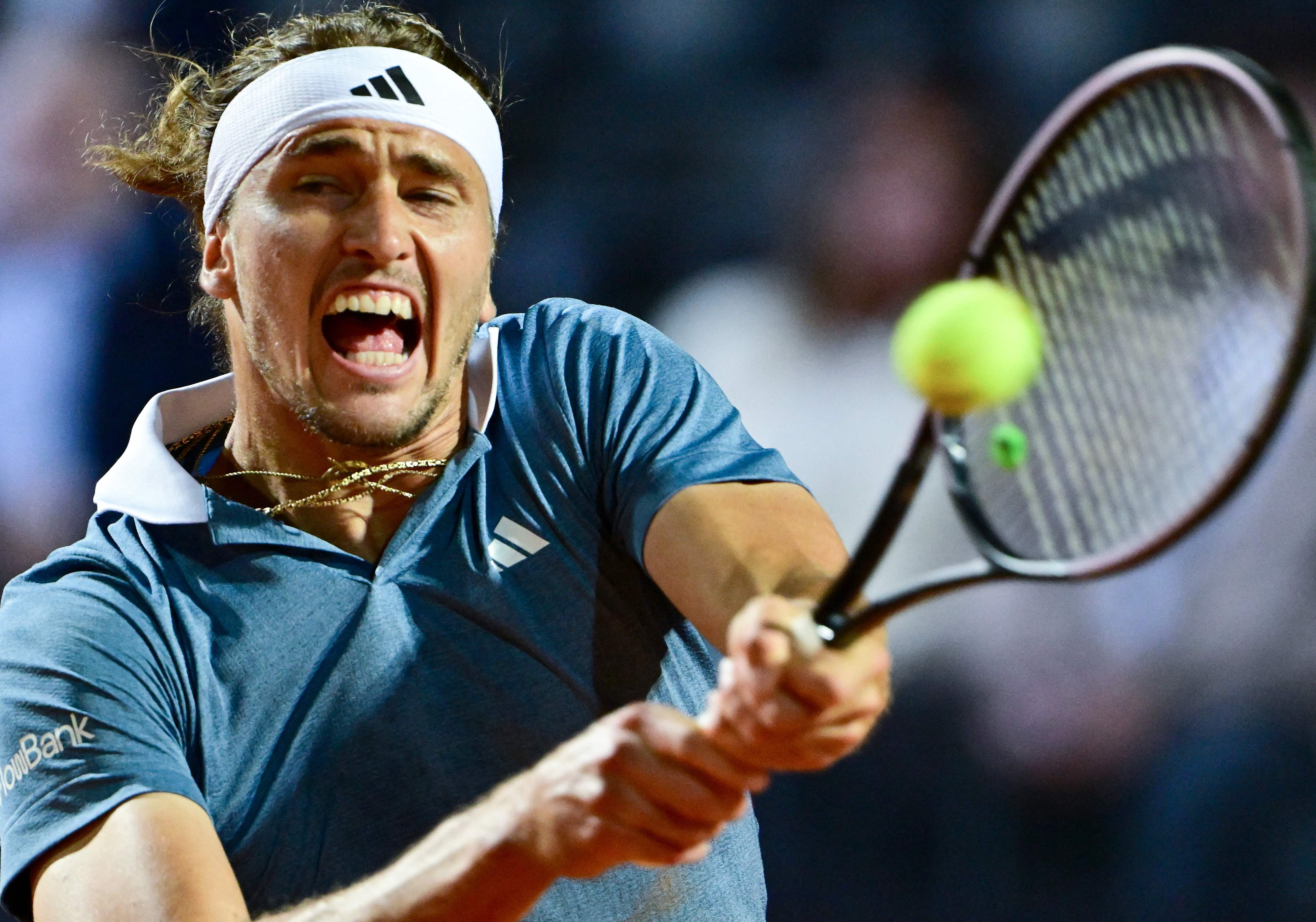 Germany's Alexander Zverev returns to Taylor Fritz of the US during their quarterfinal match in the ATP Rome Open tennis tournament at Foro Italico in Rome on May 15, 2024. (AFP)