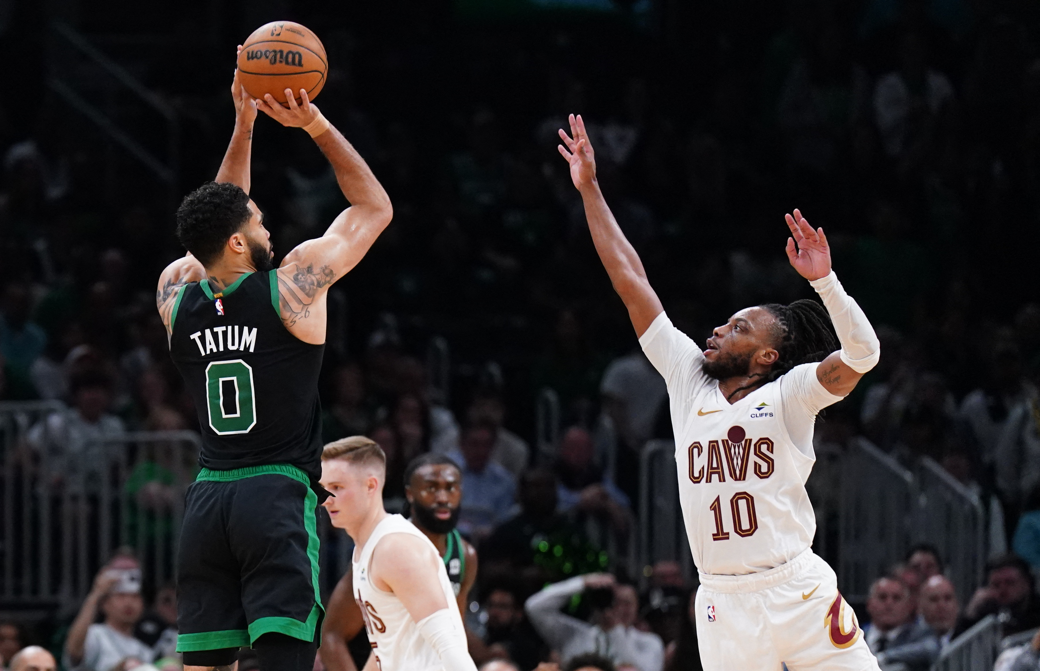 Boston Celtics forward Jayson Tatum shoots for three points against Cleveland Cavaliers guard Darius Garland in the second quarter during Game 5 of the second round for the 2024 NBA playoffs at TD Garden Wednesday. (USA TODAY Sports)
