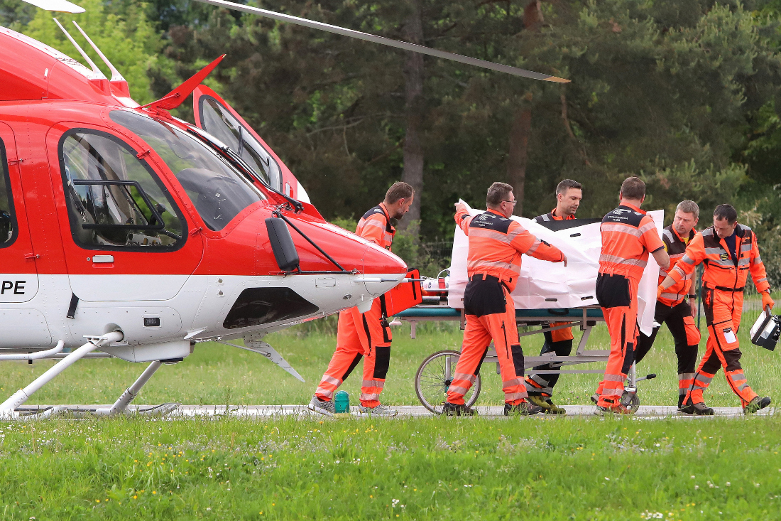 Slovak Prime Minister Robert Fico being transported from a helicopter by medics to the hospital in Banska Bystrica, Slovakia where he is to be treated after he had been shot "multiple times". (AFP)