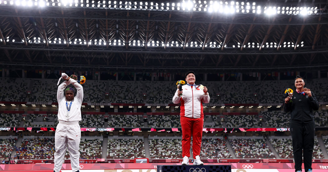 The crossed hands gesture was made on a medal podium at the Tokyo Olympics in 2021 by United States athlete Raven Saunders (Left) who won silver in women’s shot put. (X/ @FeedSportNews)