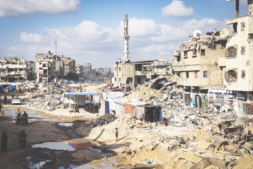 Tents are set up by displaced Palestinians amid the devastation in Khan Younis in the southern Gaza Strip as the conflict between Israel and Hamas continues. (AFP)