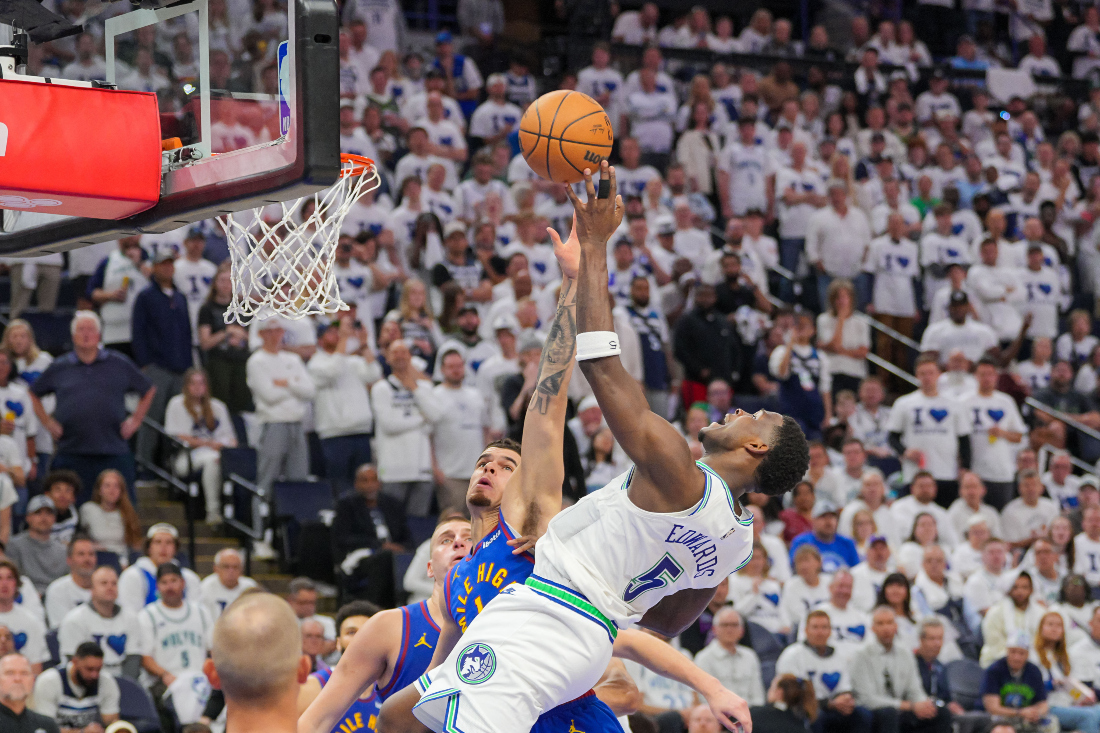 Minnesota Timberwolves guard Anthony Edwards (5) shoots against the Den ver Nuggets in the third quarter during Game 6 of 2024 NBA Western Conference semifinal series at Target Center. (USA TODAY Sports)