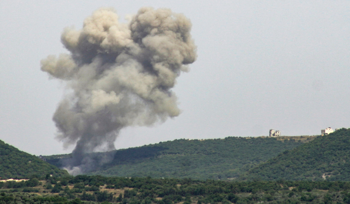 Smoke billows from the site of an Israeli airstrike on the outskirts of the southern Lebanese village of Ramiah on May 18, 2024, amid ongoing cross-border clashes between Israeli troops and Hezbollah fighters. (AFP)