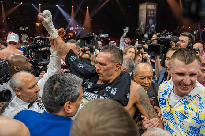 With his victory over Britain's Tyson_Fury in their Riyadh "Ring of Fire" match, Ukraine's Oleksandr Usyk joined boxing greats Muhammad Ali, Joe Louis and Mike Tyson as undisputed heavyweight champion. (AN photo by Abdulrahman bin Shalhoub)