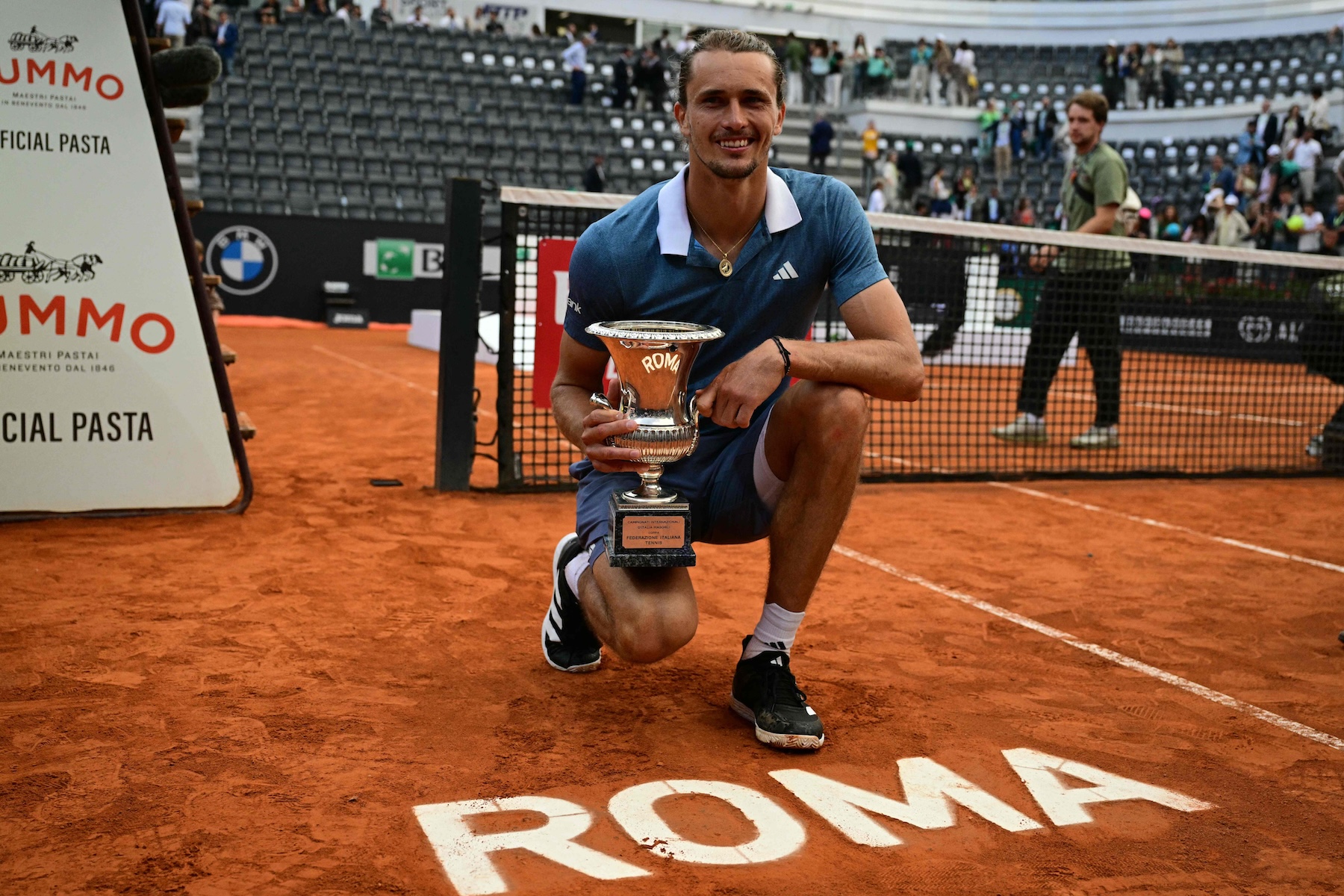Germany's Alexander Zverev with the trophy after winning the men's final against Chile's Nicolas Jarry at the ATP Italian Open tennis tournament at Foro Italico in Rome on May 19, 2024. (AFP)