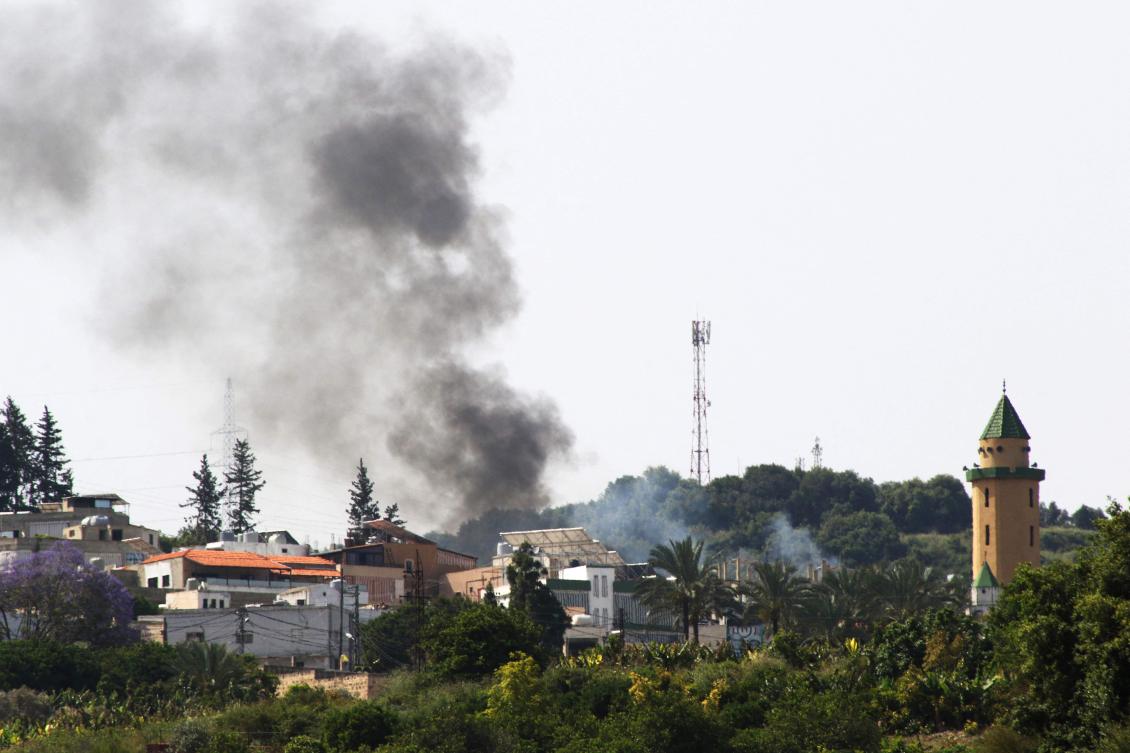 Smoke billows during Israeli bombardment over the Lebanese village of Al-Najjariyeh on May 17, 2024, in southern Lebanon near the border with Israel. (AFP)