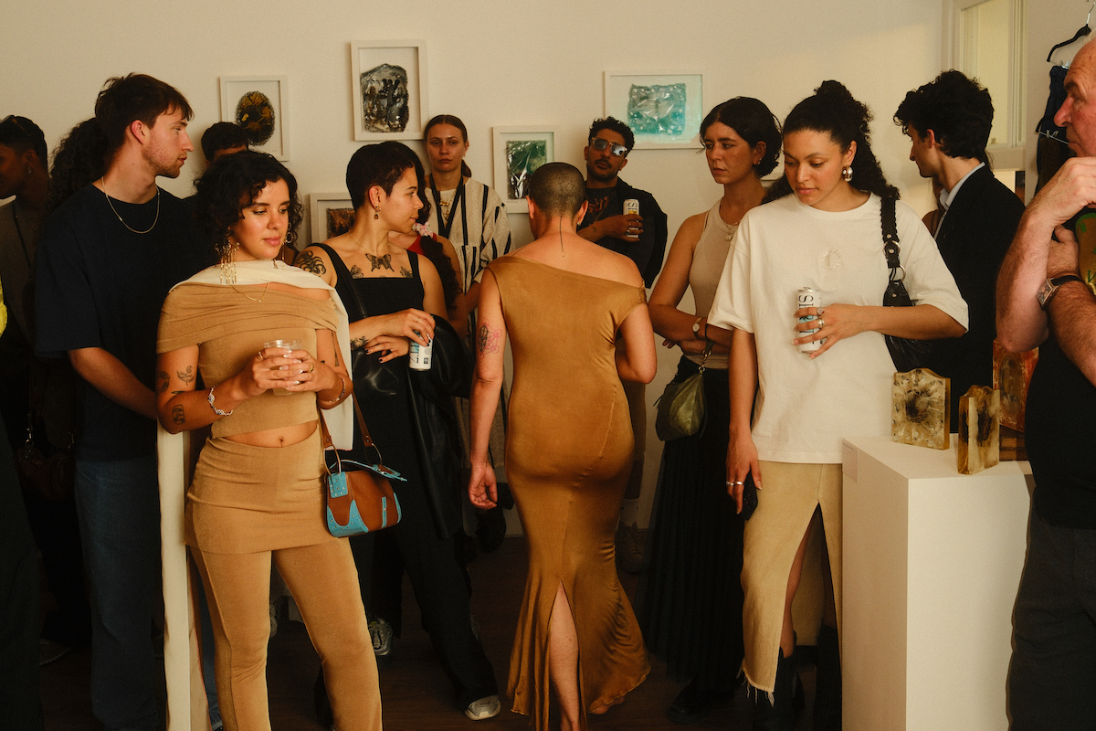 Visitors at the “Material Woman” exhibition in London. (Jules Foad)