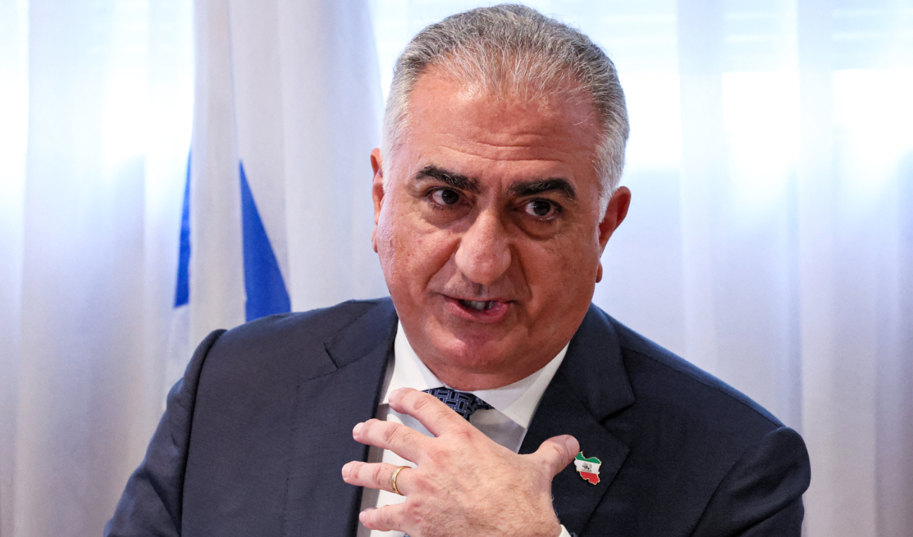 Reza Pahlavi speaks during a meeting with Israel’s intelligence minister at a hotel in Tel Aviv on April 19, 2023. (AFP/File)