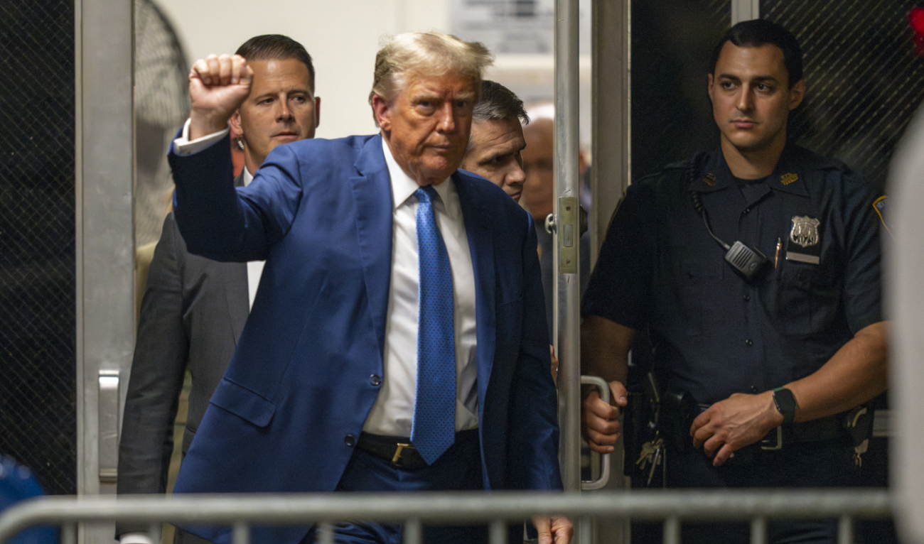 Former US President and Republican presidential candidate Donald Trump returns to the courtroom after a break in his criminal trial at Manhattan Criminal Court in New York City on May 20, 2024. (AFP)