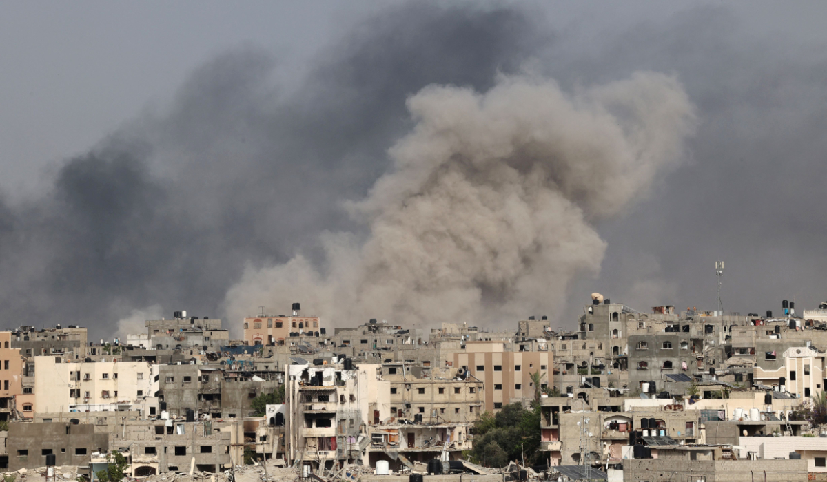 Smoke billows after an Israeli strike on Jabalia as seen from Beit Lahia, in the northern Gaza Strip on May 19, 2024, amid the ongoing conflict between Israel and the militant Hamas group. (AFP)