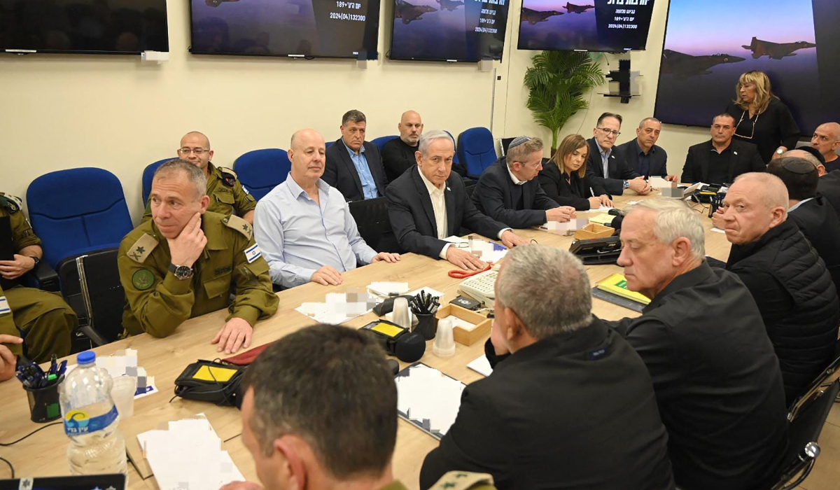 This handout picture courtesy of the Israeli Prime Minister's Office taken on April 14, 2024 shows Israel's Prime Minister Benjamin Netanyahu (C) during a War Cabinet meeting at the Kirya in Tel Aviv. (AFP)