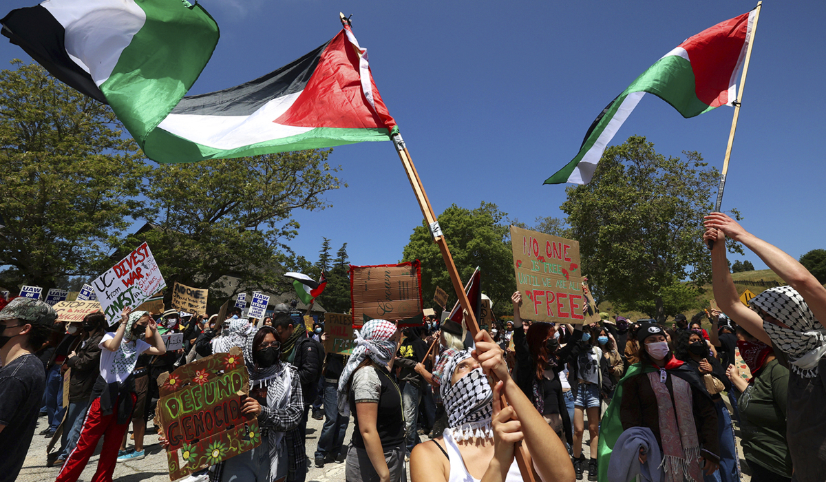 University of California, Santa Cruz graduate students and other academic workers in the UAW 4811 union begin a strike and are joined by UCSC students for Justice in Palestine as they picket the main entrance to campus on Monday, May 20, 2024, in Santa Cruz, Calif. (AP)