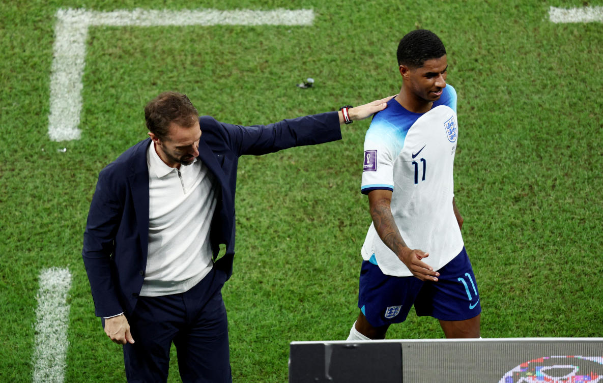 England’s Marcus Rashford with manager Gareth Southgate after being substituted during their FIFA World Cup Qatar 2022 — Group B — match against Wales at Ahmad Bin Ali Stadium, Al Rayyan, Qatar in Nov. 2022. (Reuters/File)