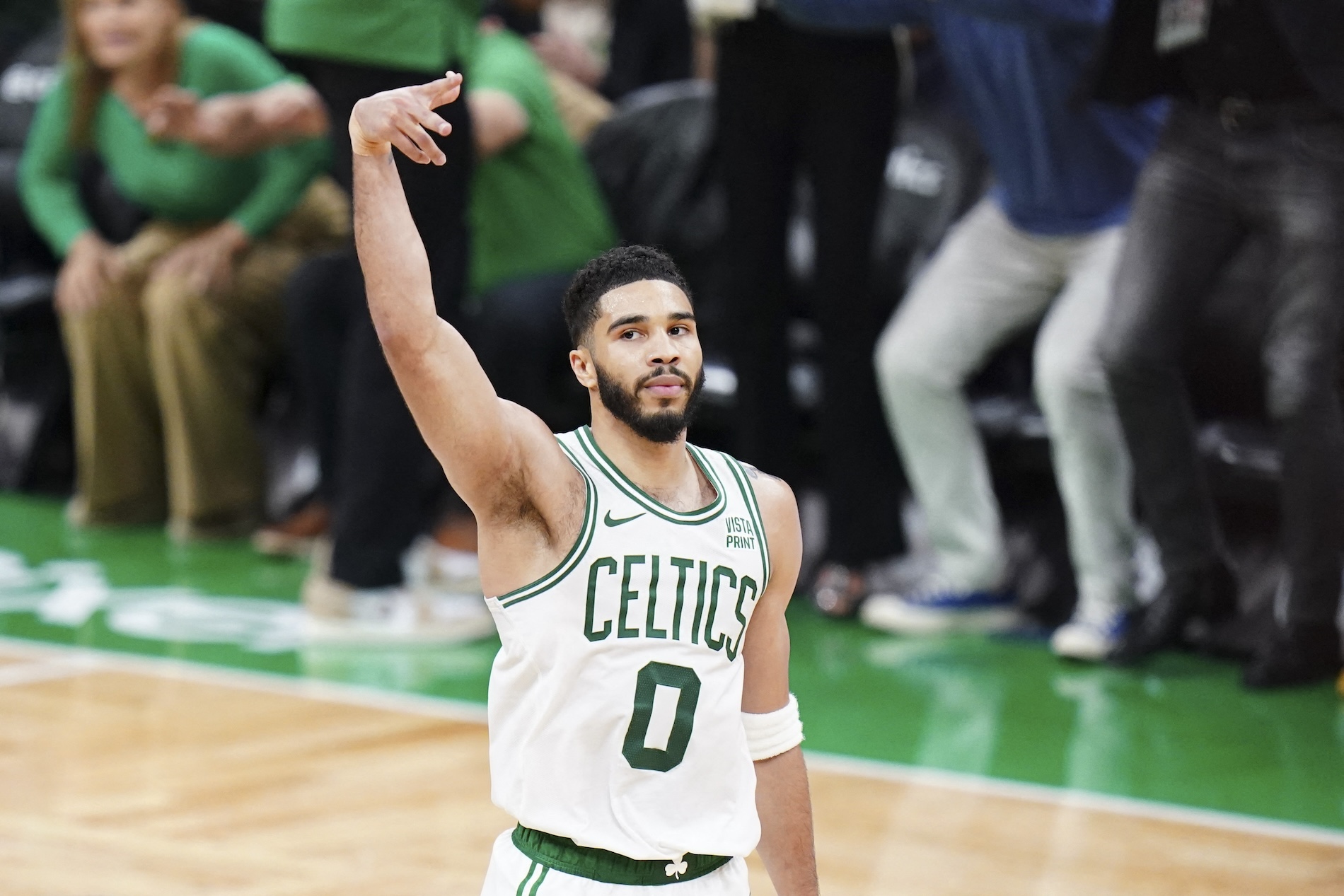 Boston Celtics forward Jayson Tatum reacts after his three-point basket against the Indiana Pacers in overtime during Game 1 of the Eastern Conference Finals for the 2024 NBA playoffs at TD Garden Tuesday. (USA TODAY Sports)