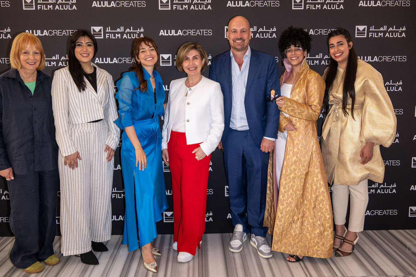 Jane Moore of Vertigo Films (Left), Mahsa Motamedi of Film AlUla (Centre) and James Richardson of Vertigo Films (Right) with the AlUla Creates winners at the Cannes showcase. (AN/ Ammar Abd Rabbo)