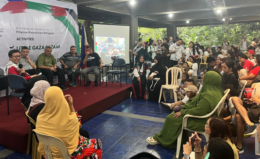 Prof. Darwin Absari moderates a roundtable discussion with Filipino-Palestinian evacuees from Gaza during an event at the University of the Philippines in Manila. (AN Photo)
