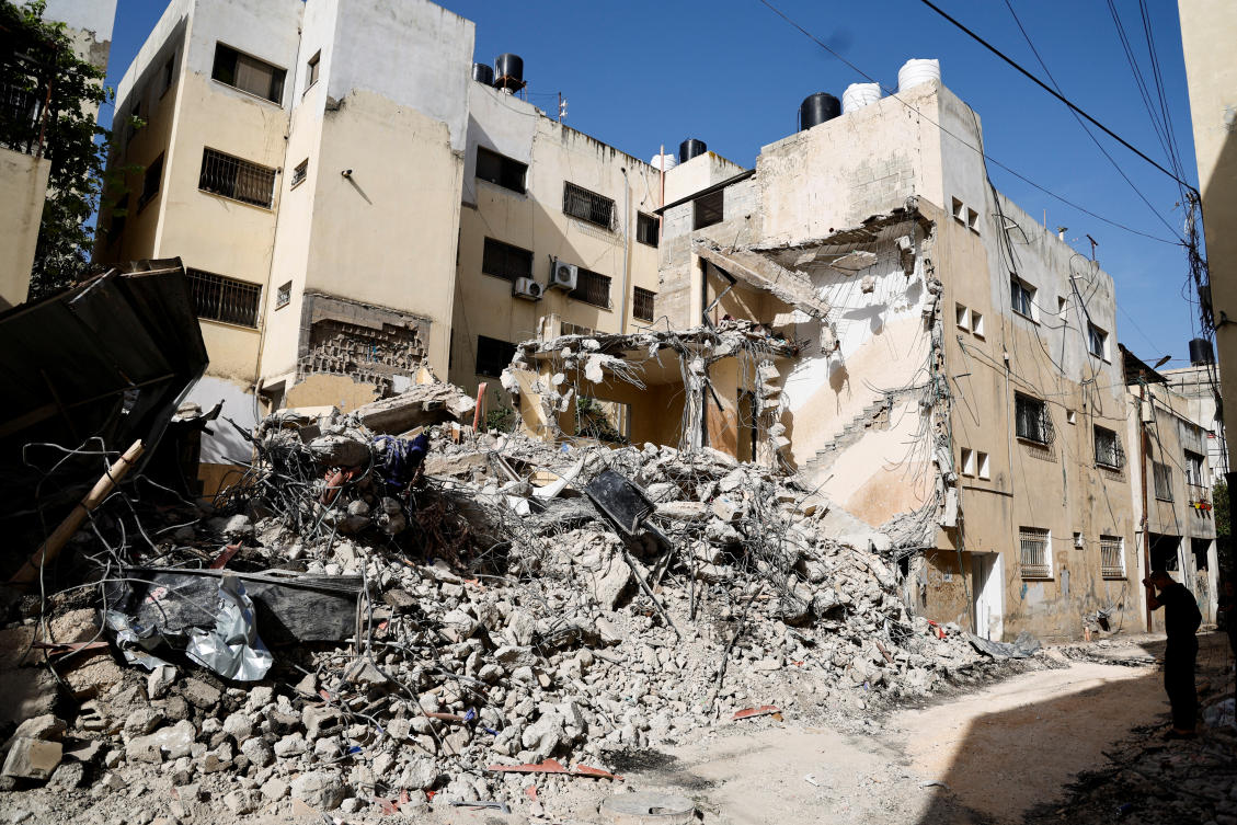 A Palestinian man inspects the damage, in the aftermath of an Israeli raid on Jenin camp in the Israeli-occupied West Bank. (Reuters)