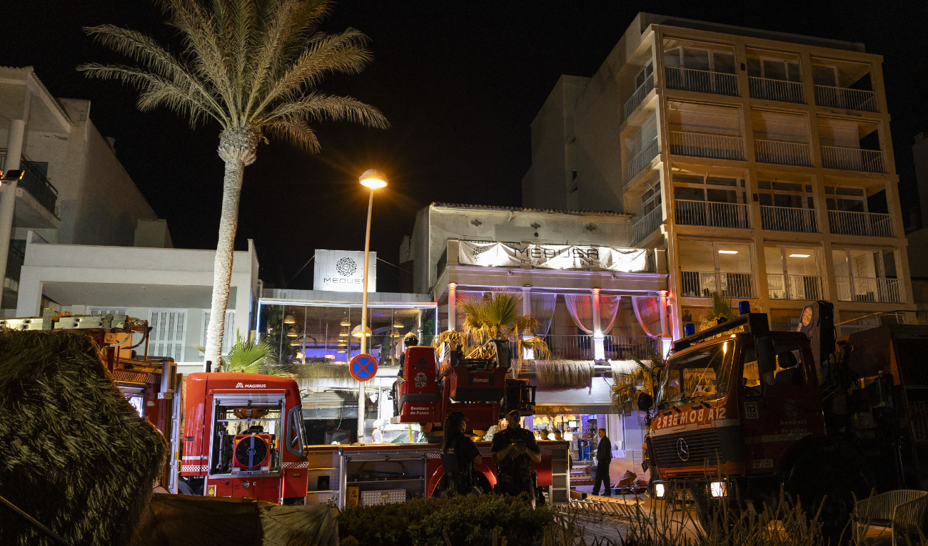 Emergency vehicles are seen after a two-story restaurant collapsed, killing four and injuring at least 17 people on Playa de Palma, south of the Spanish Mediterranean island's capital Palma de Mallorca, on May 23, 2024. (AFP)