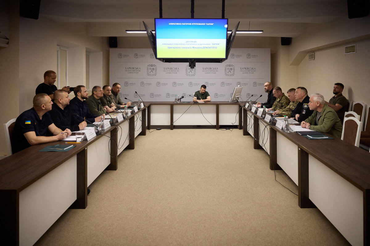 Ukraine's President Volodymyr Zelensky (C) takes part in a meeting to address the operational situation in the Kharkiv region and preparations for the upcoming autumn and winter period, amid the Russian invasion of Ukraine. (Ukrainian Presidential Press Office via AP)