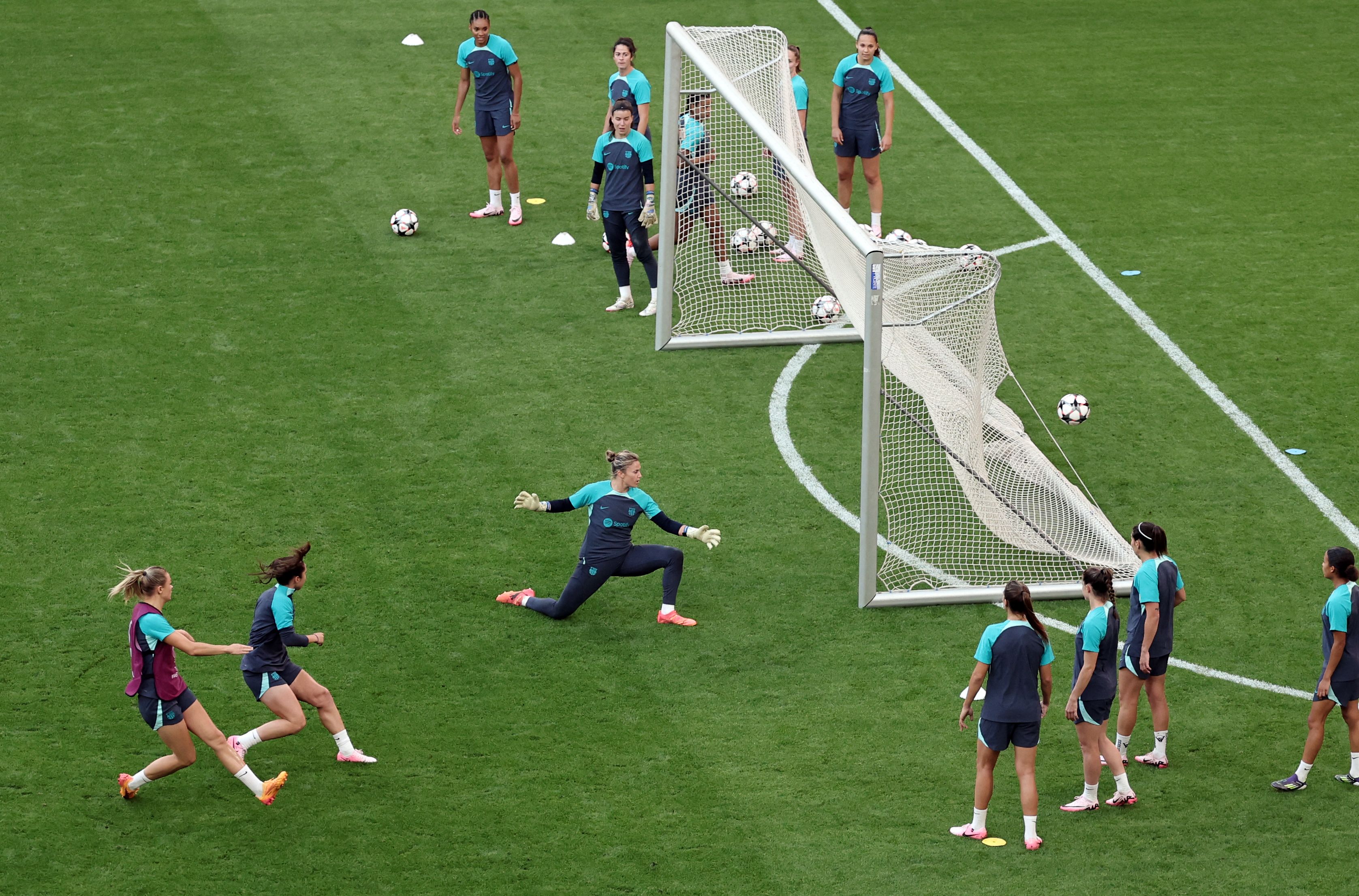 Barcelona players attend a training session on the eve of their UEFA Women's Champions League final against Olympique Lyonnais at the San Mames stadium in Bilbao on May 24, 2024. (AFP)