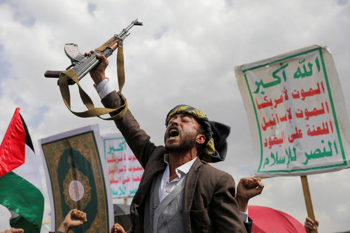 The Houthis are the de facto authorities in northern Yemen. Above, an armed Houthi supporter in Sanaa. (Reuters)