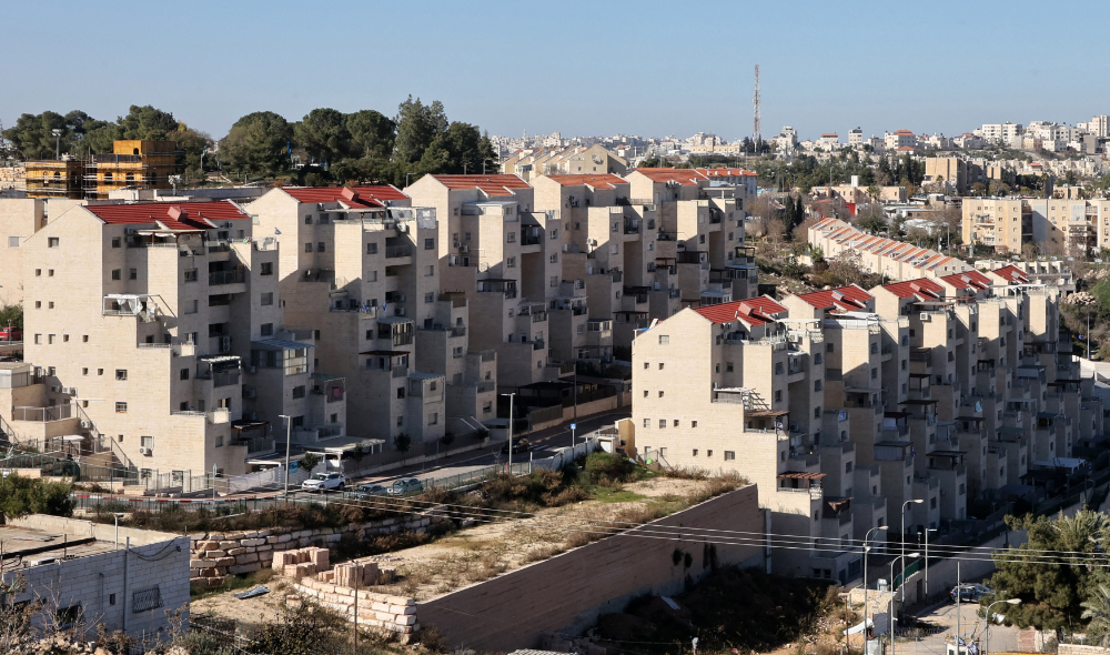 There has been “a major uptick” in efforts to create illegal settlements in East Jerusalem either within or alongside Palestinian neighborhoods. (AFP)