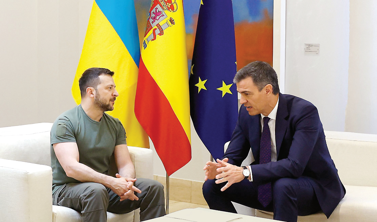 Ukraine’s President Volodymyr Zelensky talks with Prime Minister Pedro Sanchez during their meeting at La Moncloa Palace in Madrid on Monday. (AFP)