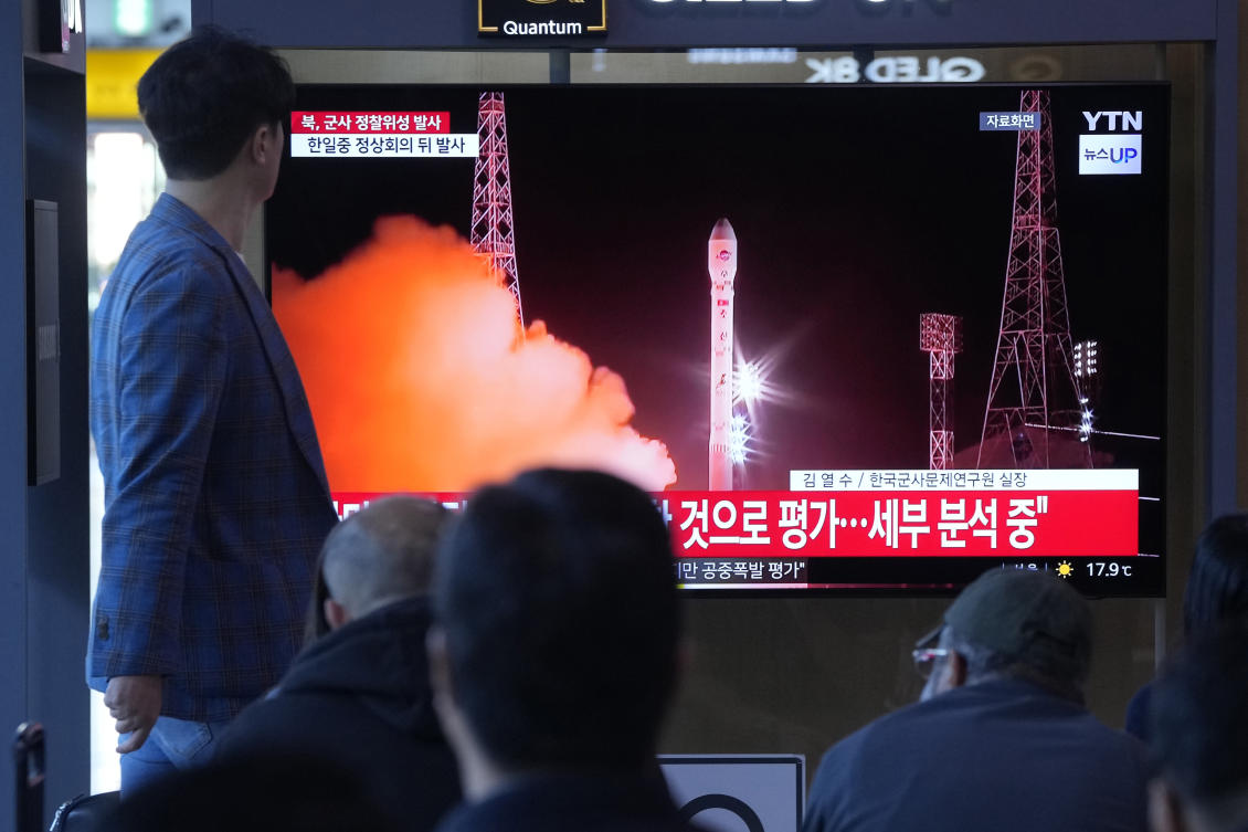 A rocket launched by North Korea to deploy the country’s second spy satellite exploded shortly after liftoff Monday, state media reported. Above, people watch a news program broadcasting file images of a rocket launch by North Korea in Seoul, South Korea on May 28, 2024. (AP)