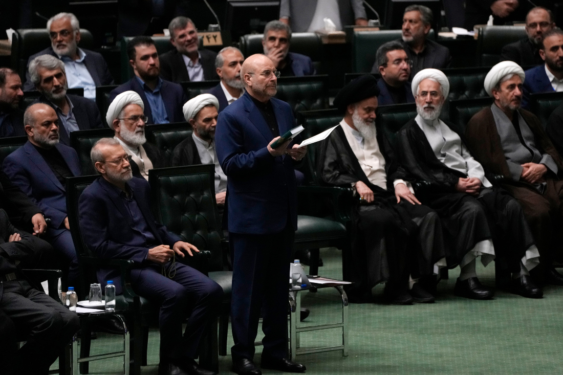 Mohammad Bagher Qalibaf, center, takes an oath during the opening ceremony of the new parliament term in Tehran, Iran. (AP)