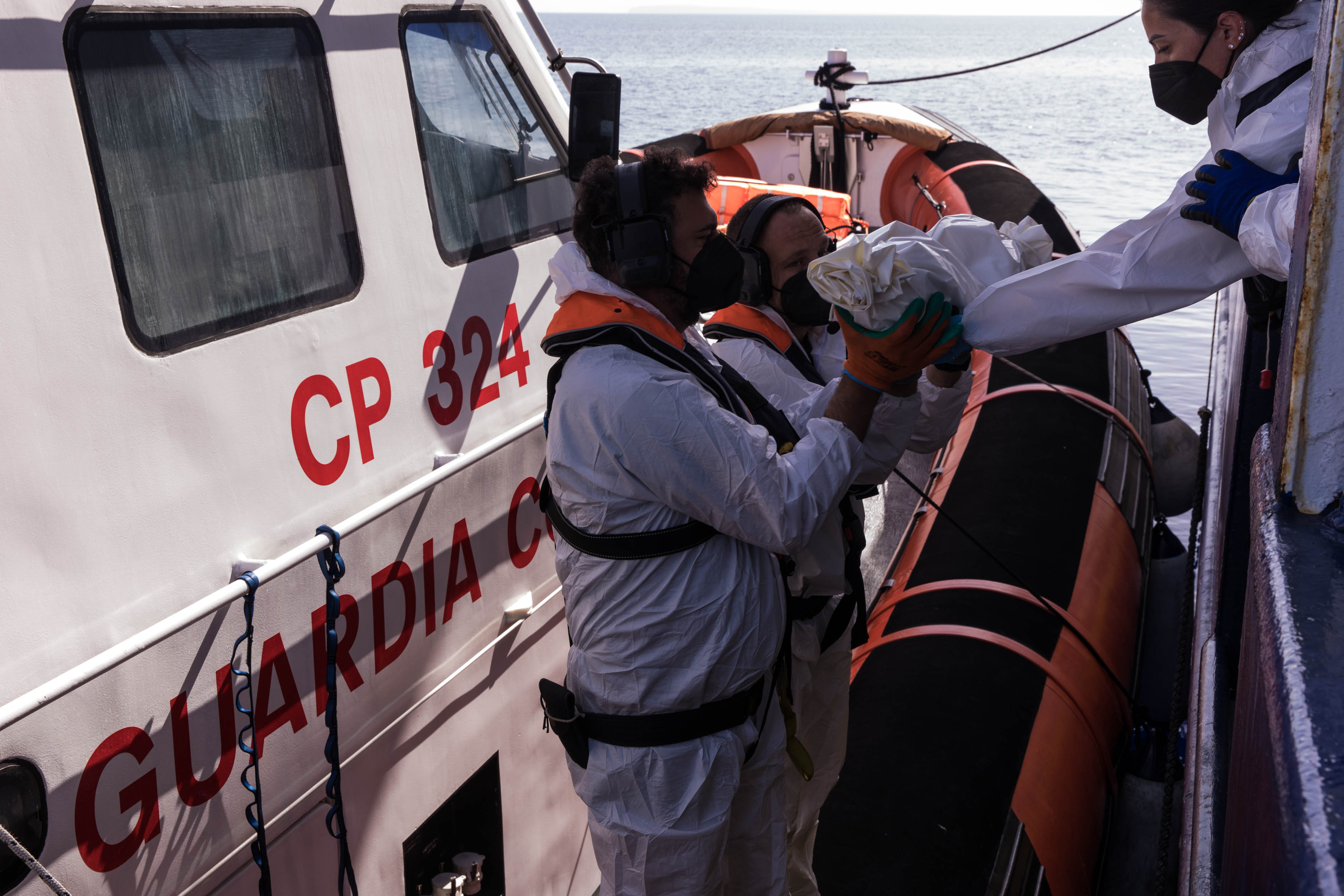 SOS Humanity workers aboard its "Humanity 1" vessel found many of the migrants exhausted and suffering from seasickness and fuel burns as they were rescued before dawn on Tuesday, the group said in a statement. (X/@soshumanity_en)