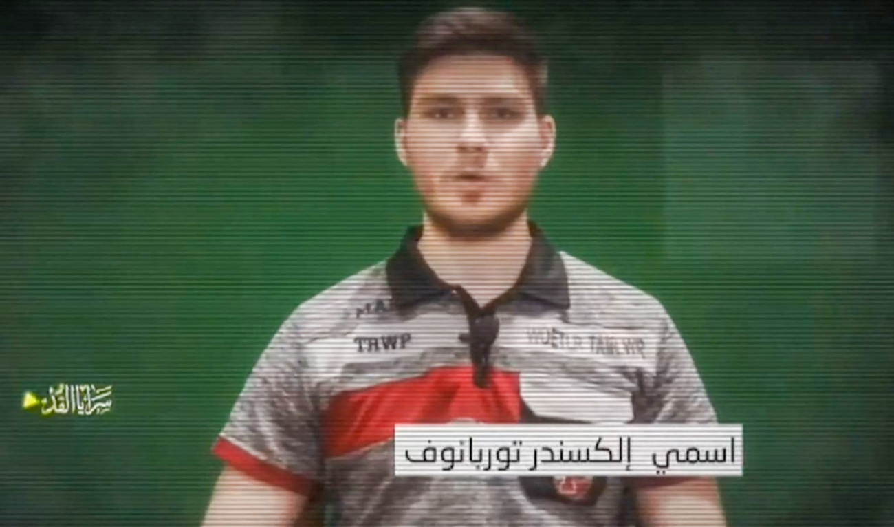 An image grab from a video released by the Palestinian militant group Islamic Jihad on May 28, 2024, shows an Israeli hostage held in Gaza, identified by Israeli media as 28-year-old Russian-Israeli hostage Sasha Trupanov, speaking to the camera. (AFP)