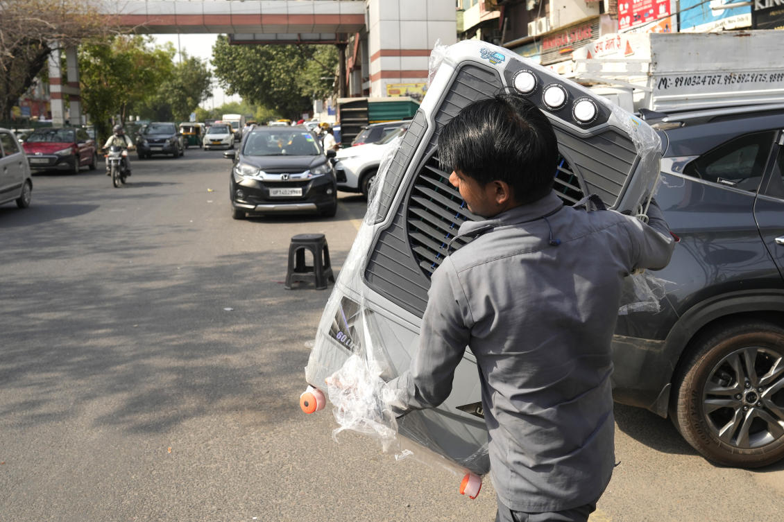 ‘Severe heat-wave conditions’ were recorded two Delhi suburbs stations at Narela and Mungeshpur. (AP)